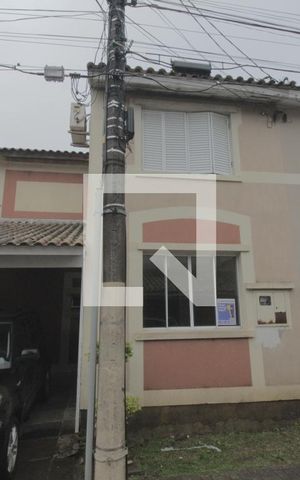 Casa de condomínio à venda com 107m², 4 quartos e 2 vagasFachada da casa