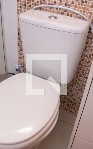 Casa de condomínio para alugar com 51m², 2 quartos e 2 vagas Casa de condomínio para alugar com 51m², 2 quartos e 2 vagasBanheiro do Quarto 1