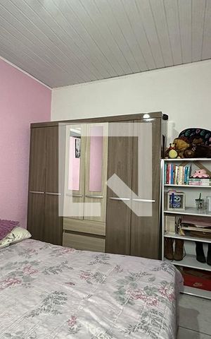 Casa à venda com 160m², 6 quartos e 3 vagasQuarto 2 casa 1