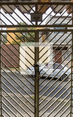 Casa à venda com 106m², 2 quartos e 1 vaga Casa à venda com 106m², 2 quartos e 1 vagaVista da garagem