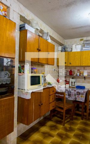 Casa à venda com 144m², 2 quartos e 2 vagas Casa à venda com 144m², 2 quartos e 2 vagasCozinha