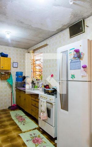 Casa à venda com 144m², 2 quartos e 2 vagas Casa à venda com 144m², 2 quartos e 2 vagasCozinha