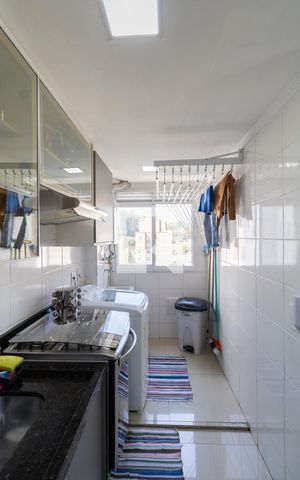 Apartamento à venda com 47m², 2 quartos e 1 vaga Apartamento à venda com 47m², 2 quartos e 1 vagaCozinha e Área de Serviço