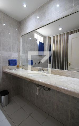 Casa de condomínio à venda com 400m², 5 quartos e 2 vagasBanheiro da Suíte