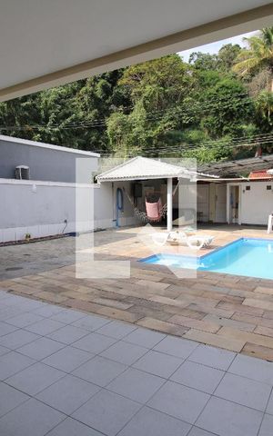 Casa de condomínio à venda com 400m², 5 quartos e 2 vagasÁrea Externa na Frente