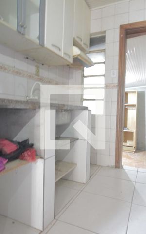 Casa para alugar com 70m², 2 quartos e 2 vagasCozinha