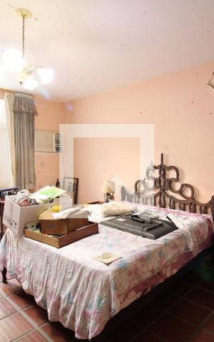 Casa à venda com 477m², 5 quartos e 3 vagasQuarto 5 - Suíte