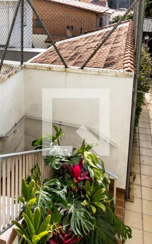 Casa à venda com 380m², 5 quartos e 2 vagasTerraço- detalhe escada de acesso à lavanderia e à piscina e churrasqueira 