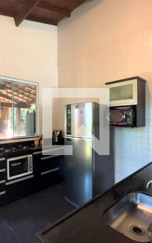 Casa de condomínio à venda com 300m², 4 quartos e 4 vagas Casa de condomínio à venda com 300m², 4 quartos e 4 vagasCozinha