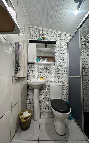 Casa à venda com 180m², 4 quartos e 2 vagasBanheiro 2