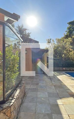 Casa de condomínio à venda com 950m², 4 quartos e 10 vagas Casa de condomínio à venda com 950m², 4 quartos e 10 vagasÁrea externa