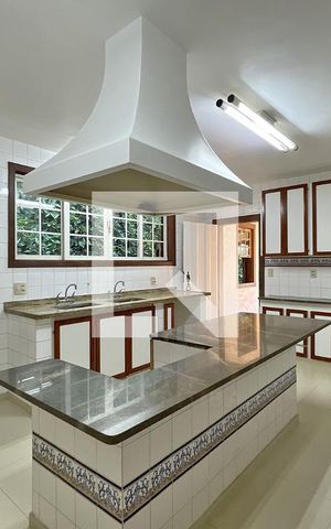 Casa de condomínio à venda com 950m², 4 quartos e 10 vagas Casa de condomínio à venda com 950m², 4 quartos e 10 vagasCozinha
