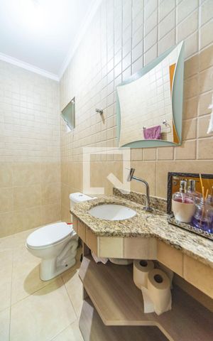 Casa à venda com 313m², 3 quartos e 3 vagas Casa à venda com 313m², 3 quartos e 3 vagasBanheiro da Área Gourmet