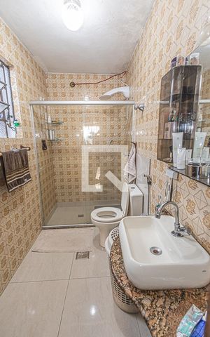 Casa à venda com 400m², 4 quartos e 2 vagasBanheiro