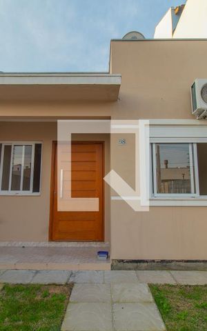 Casa à venda com 70m², 2 quartos e 2 vagas Casa à venda com 70m², 2 quartos e 2 vagasFachada