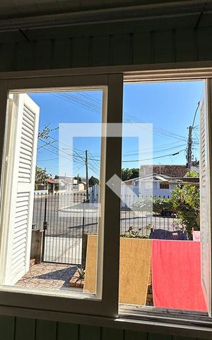 Casa à venda com 60m², 2 quartos e 2 vagasSala - Janela
