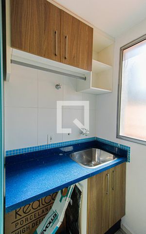 Apartamento à venda com 48m², 2 quartos e 1 vaga Apartamento à venda com 48m², 2 quartos e 1 vagaCozinha e Área de Serviço