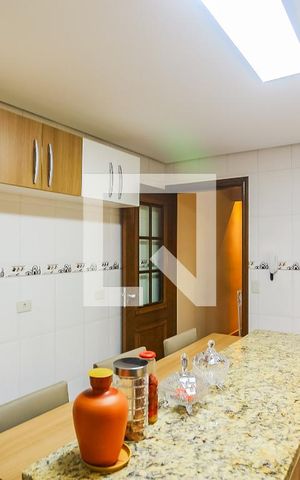 Casa à venda com 131m², 3 quartos e 3 vagas Casa à venda com 131m², 3 quartos e 3 vagasCozinha