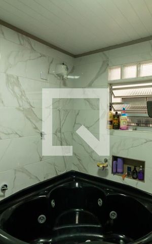 Casa à venda com 300m², 4 quartos e 5 vagas Casa à venda com 300m², 4 quartos e 5 vagasBanheiro da Suíte
