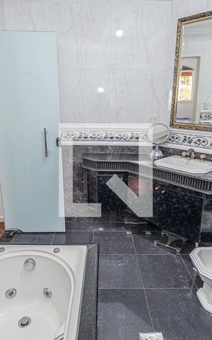 Casa à venda com 591m², 4 quartos e 3 vagasBanheiro suite