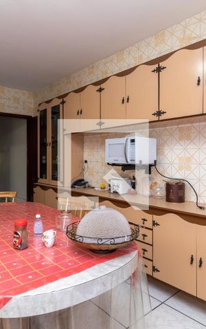 Casa à venda com 295m², 4 quartos e 4 vagas Casa à venda com 295m², 4 quartos e 4 vagasCozinha