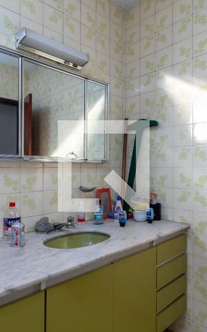 Casa à venda com 295m², 4 quartos e 4 vagas Casa à venda com 295m², 4 quartos e 4 vagasBanheiro da Suíte 1