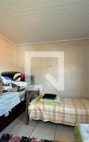 Casa à venda com 120m², 3 quartos e sem vagaQuarto 2 