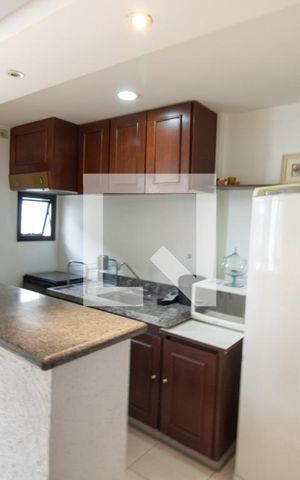 Studio para alugar com 52m², 1 quarto e 1 vaga Studio para alugar com 52m², 1 quarto e 1 vagaCozinha americana - balcão