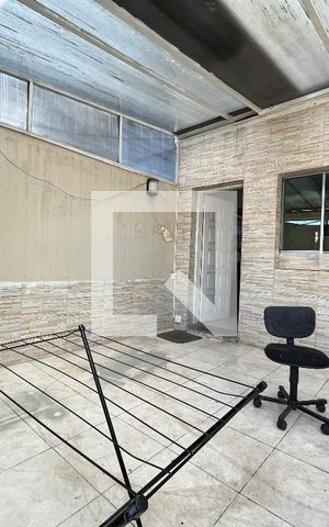 Casa à venda com 100m², 2 quartos e 2 vagas Casa à venda com 100m², 2 quartos e 2 vagasÁrea externa