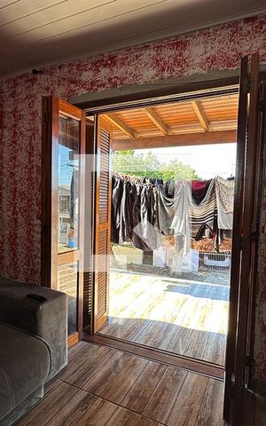 Casa à venda com 118m², 3 quartos e 1 vagaPorta Janela da Sala