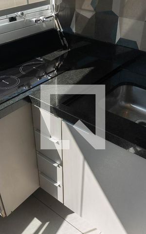 Studio à venda com 33m², 1 quarto e 1 vaga Studio à venda com 33m², 1 quarto e 1 vagaCozinha