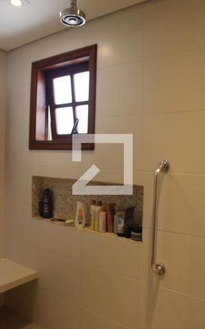Casa de condomínio para alugar com 290m², 5 quartos e 3 vagasBanheiro Suíte 1 -  Piso 2