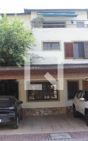 Casa de condomínio para alugar com 290m², 5 quartos e 3 vagasFrente do imóvel - Garagem