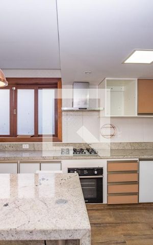 Casa de condomínio à venda com 450m², 4 quartos e 4 vagas Casa de condomínio à venda com 450m², 4 quartos e 4 vagasCozinha