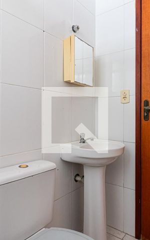 Casa de condomínio para alugar com 75m², 2 quartos e 2 vagasBanheiro da Suíte 1