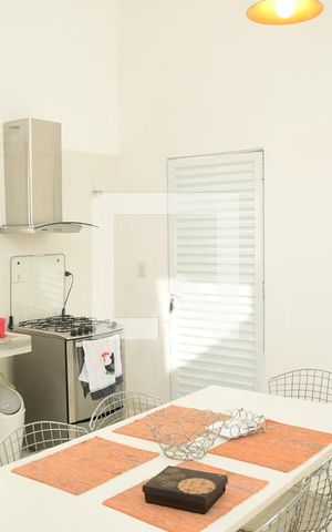Casa de condomínio para alugar com 250m², 3 quartos e 2 vagasCozinha