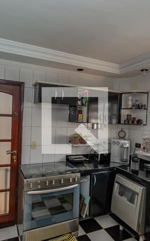 Casa de condomínio à venda com 220m², 4 quartos e 4 vagas Casa de condomínio à venda com 220m², 4 quartos e 4 vagasCozinha