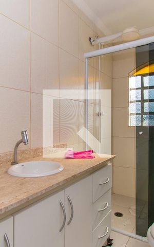 Casa à venda com 415m², 4 quartos e 5 vagas Casa à venda com 415m², 4 quartos e 5 vagasBanheiro da Suíte 2