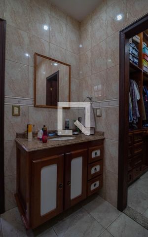Casa à venda com 450m², 6 quartos e 4 vagasBanheiro da Suíte