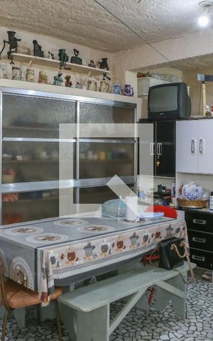 Casa à venda com 260m², 2 quartos e 3 vagas Casa à venda com 260m², 2 quartos e 3 vagasCozinha e Área de Serviço