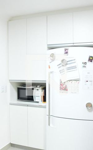 Casa de condomínio para alugar com 90m², 3 quartos e 2 vagasCozinha