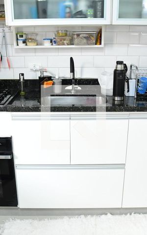 Casa de condomínio para alugar com 90m², 3 quartos e 2 vagasCozinha