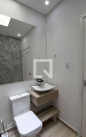 Casa de condomínio para alugar com 230m², 3 quartos e 4 vagasBanheiro da Suíte 3