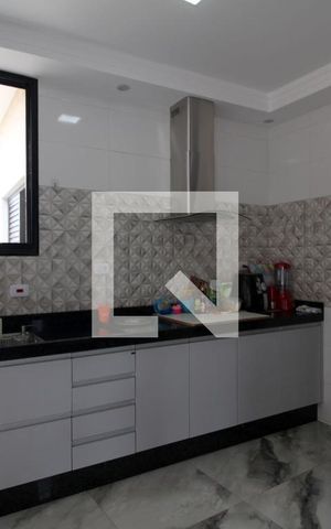 Casa de condomínio para alugar com 230m², 3 quartos e 4 vagasCozinha