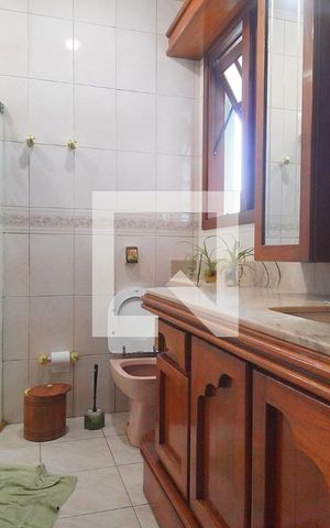 Casa à venda com 420m², 4 quartos e 3 vagasBanheiro da Suíte