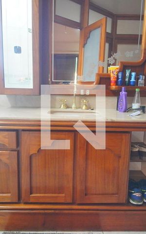 Casa à venda com 420m², 4 quartos e 3 vagasBanheiro da Suíte 