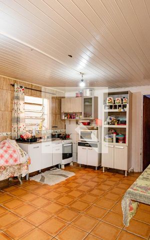 Casa à venda com 90m², 4 quartos e 2 vagas Casa à venda com 90m², 4 quartos e 2 vagasCozinha