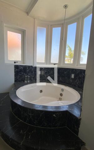 Casa de condomínio à venda com 533m², 4 quartos e 4 vagasBanheiro da Suíte 1