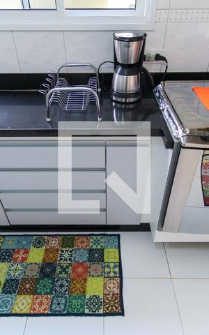 Casa à venda com 300m², 4 quartos e 4 vagas Casa à venda com 300m², 4 quartos e 4 vagasCozinha