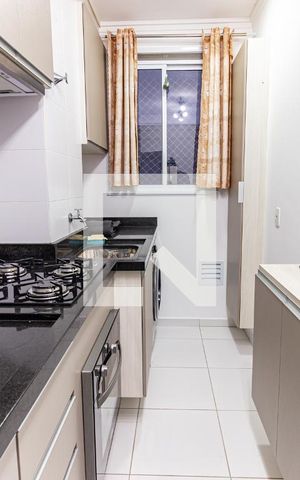 Apartamento à venda com 40m², 2 quartos e sem vaga Apartamento à venda com 40m², 2 quartos e sem vagaCozinha e Área de Serviço